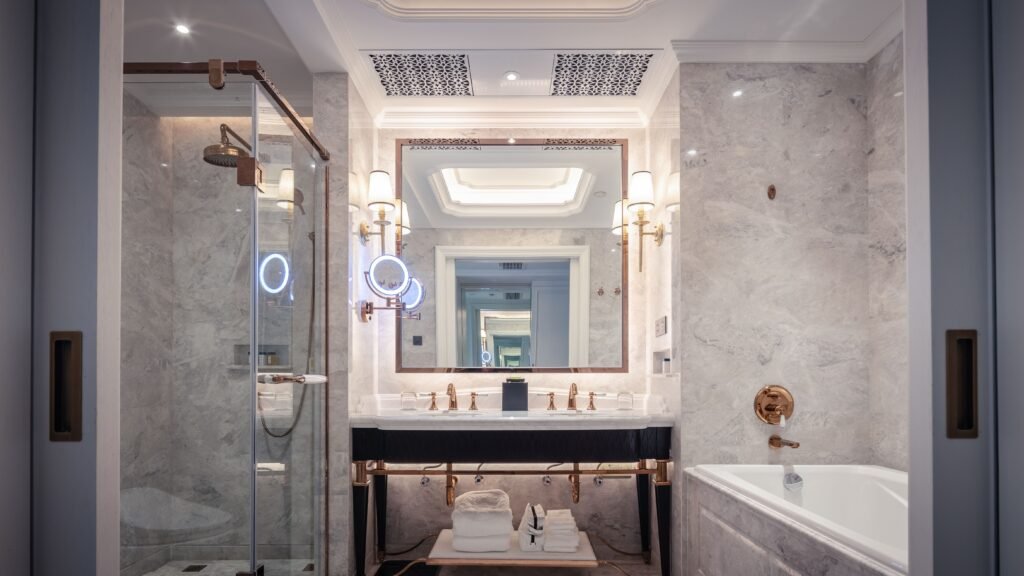 Bathroom accessories collection including soap dispenser and storage items